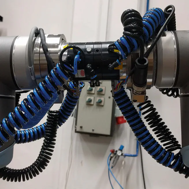 Base Frame Calibration of a Reconfigurable Multi-robot System with Kinesthetic Guidance